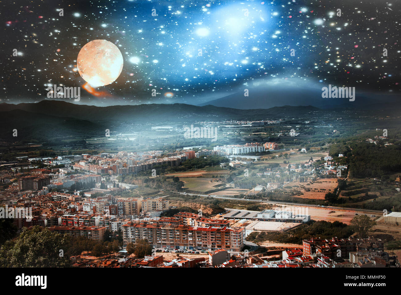 Shangri-La. City in mountain valley under wonderful sky. Wandering lights of Andersen. Elements of this image furnished by NASA. Stock Photo
