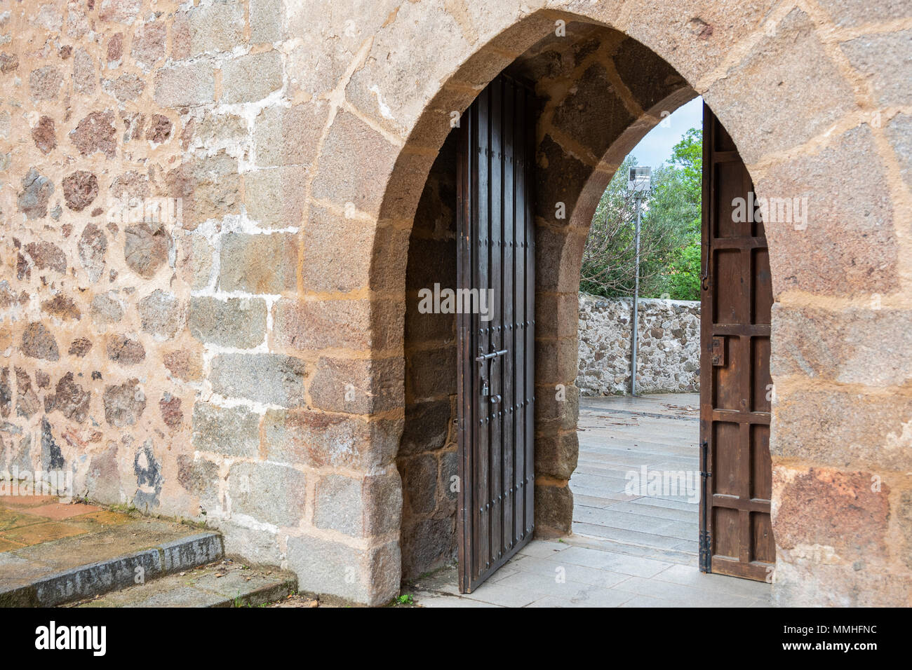 Medieval double-leaf door detail in Gothic style. Community of Castilla la Mancha.Spain Stock Photo