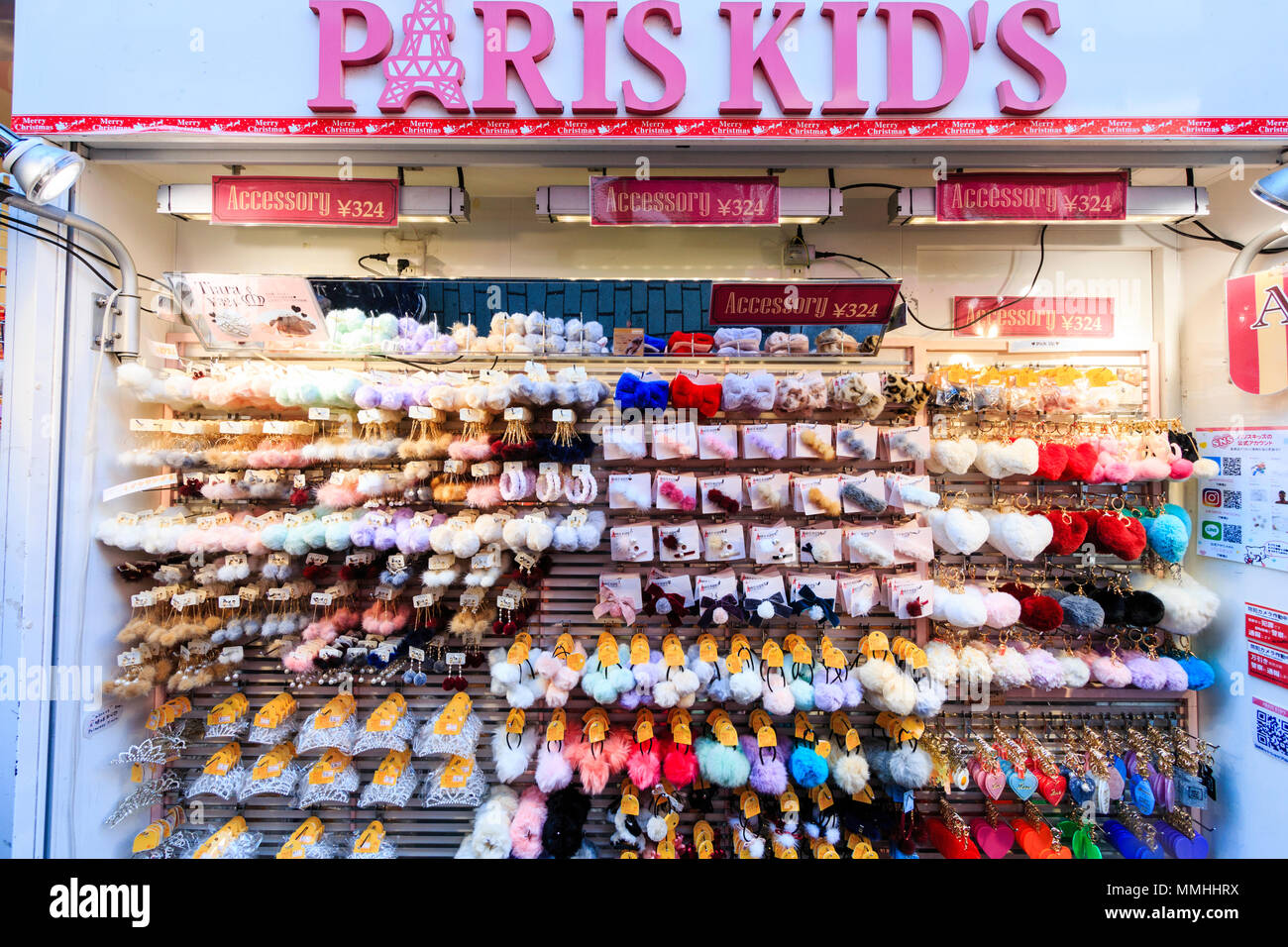 Tokyo, Harajuku, Takeshita street. Paris Kids, famous fashion store, shop front, display of rows of Women's fashion accessories Stock Photo -