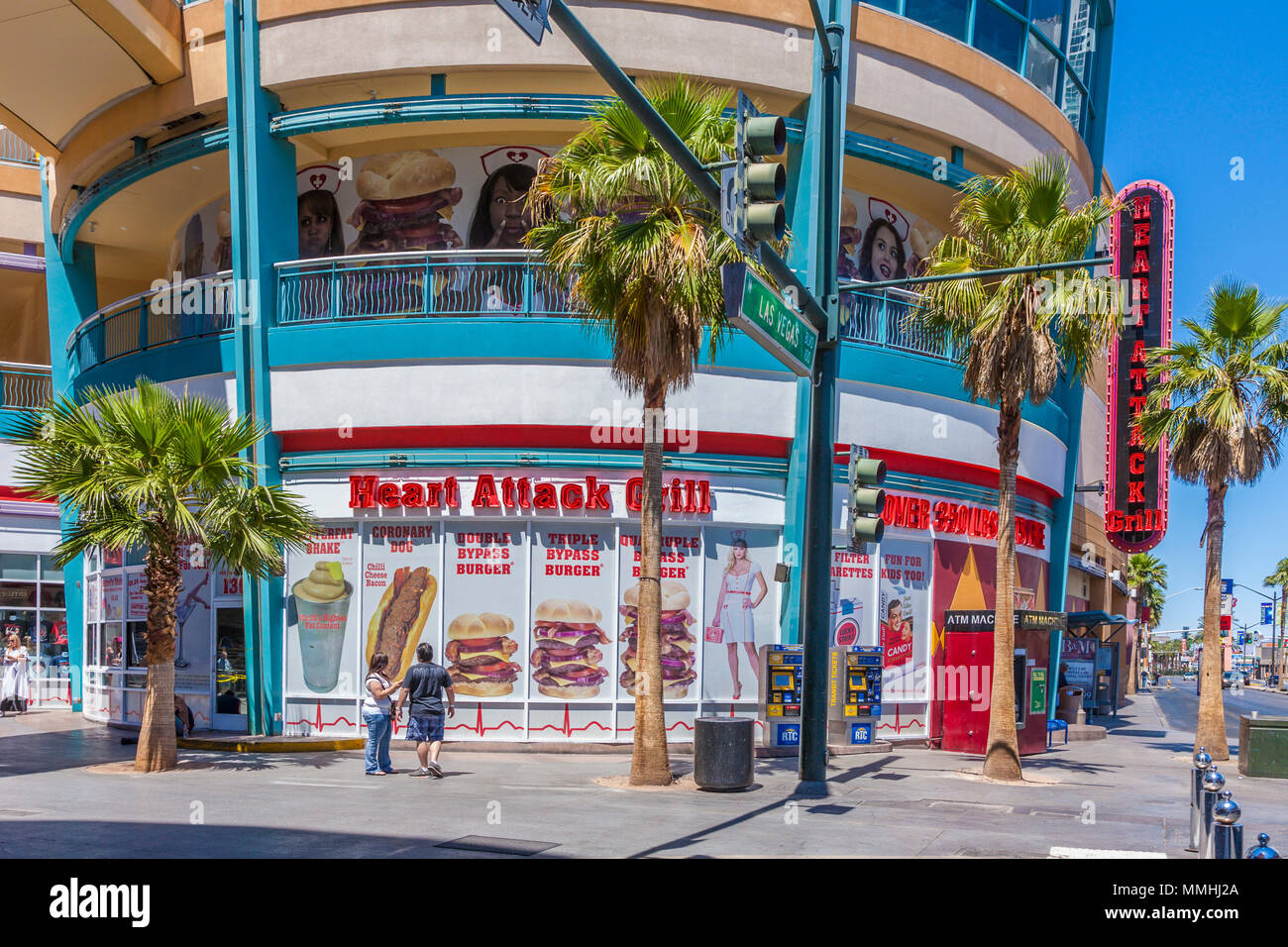 Signs show the menu in the windows of the Heart Attack Grill on Fremont Street in Las Vegas, Nevada Stock Photo