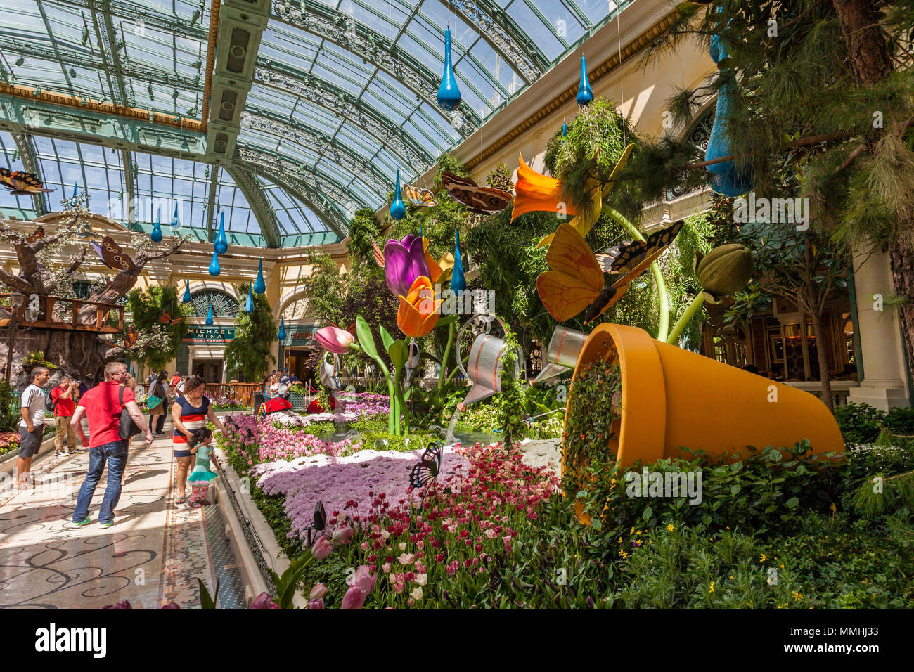 Tourists visiting Bellagio's Conservatory & Botanical Gardens in the Bellagio Luxury Resort and Casino on the Las Vegas Strip in Paradise, Nevada Stock Photo