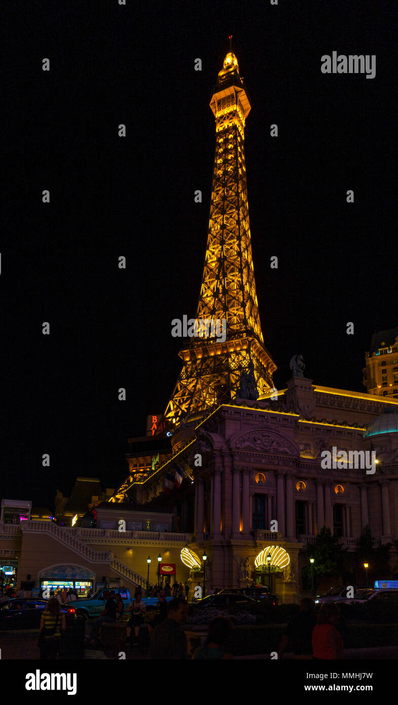 Scale replica of the Eiffel Tower at Paris Las Vegas Hotel and Casino lit up at night on the Las Vegas Strip in Paradise, Nevada Stock Photo