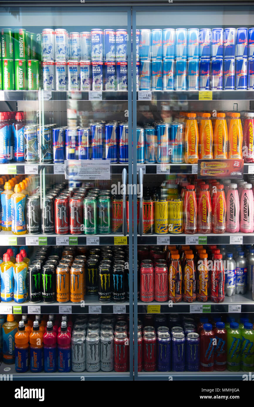 Fizzy drinks on sale in a supermarket fridge chiller. Stock Photo