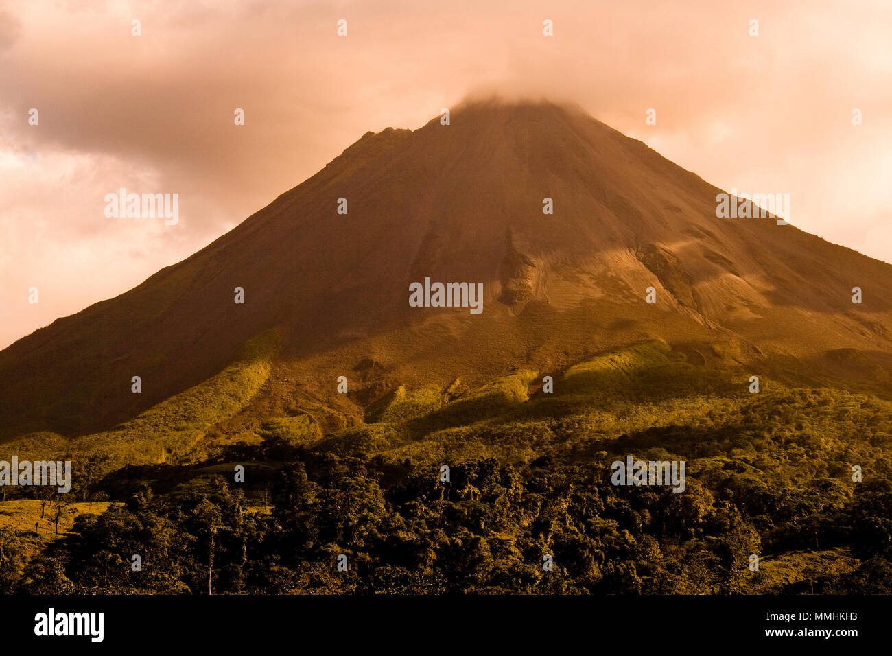 Arenal volcano at dusk, Costa Rica Stock Photo