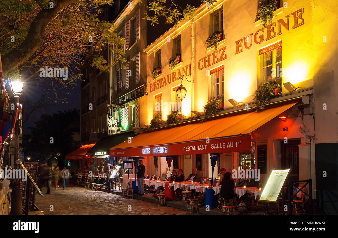 The French traditional cafe Chez Eugene at night, Paris, France. Stock Photo
