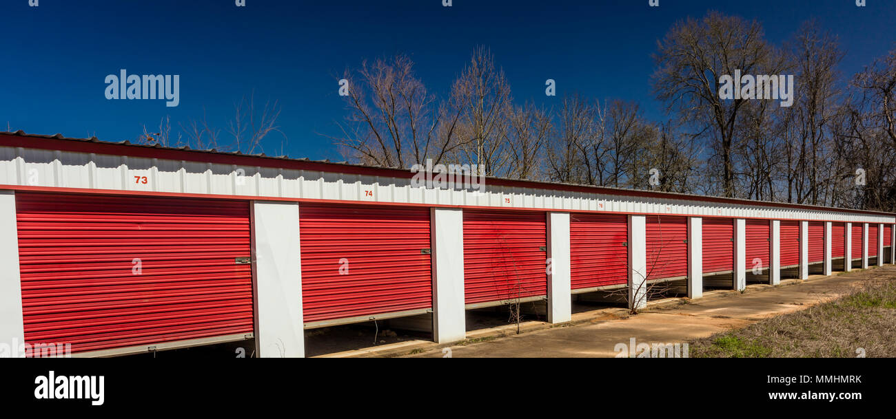 MARCH 6, 2018 Self storage warehouse with open red doors outside
