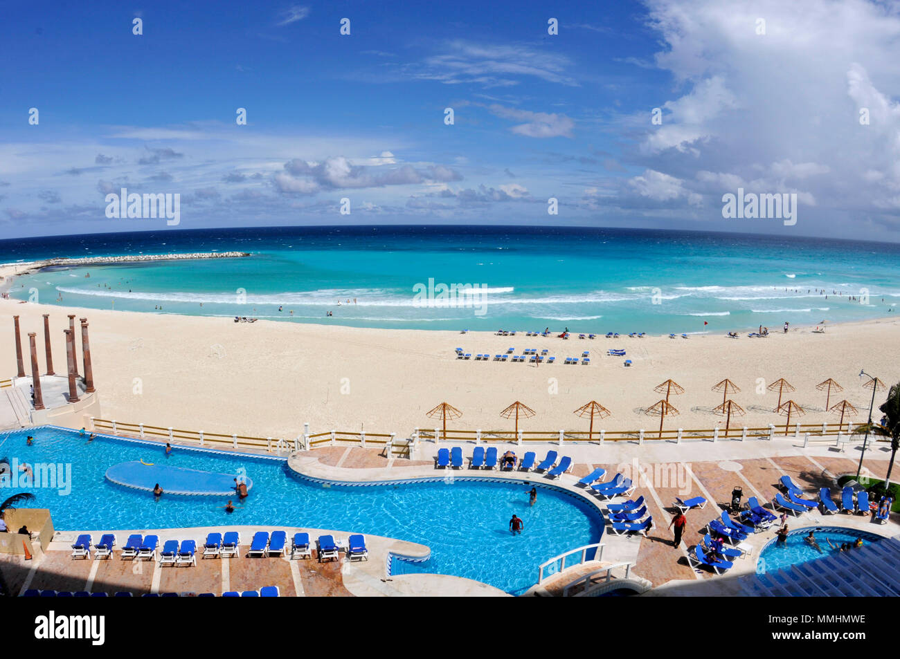 Pool at a beachfront resort in tropical Cancun, Yucatan, Mexico, Caribbean Sea Stock Photo