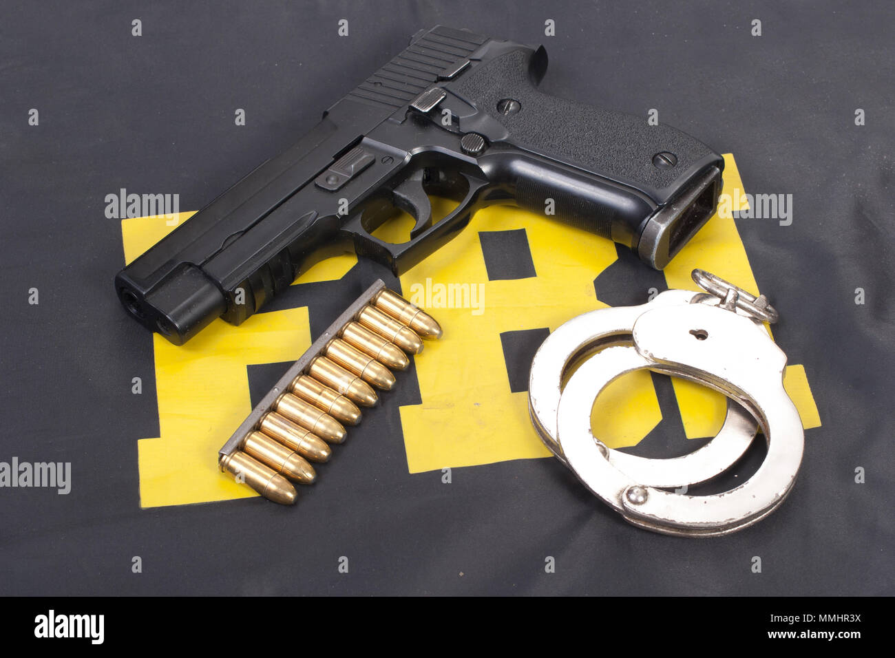 fbi concept with gun ammo and handcuffs Stock Photo