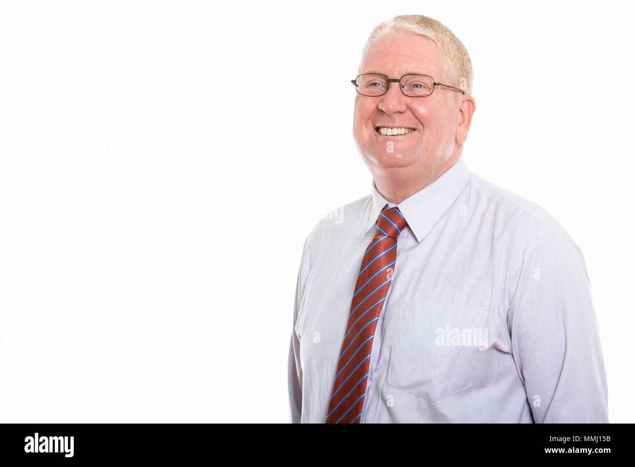 Thoughtful smiling mature man hi-res stock photography and images - Alamy
