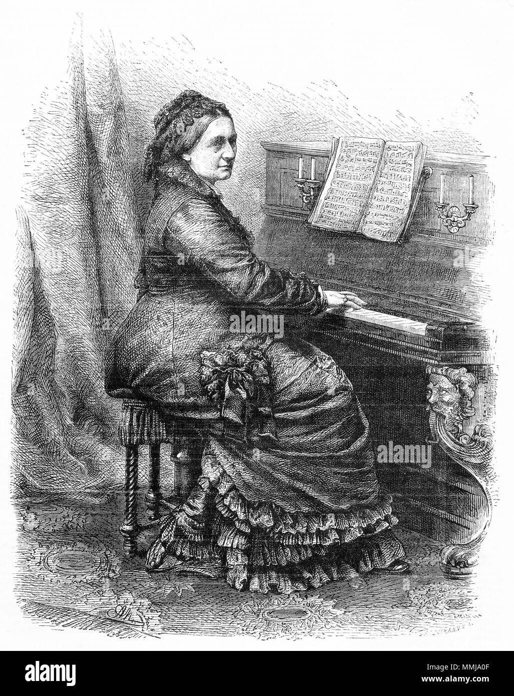 Engraving of Madame Schumann playing a piano. From an original engraving in the Girl's Own Paper magazine 1883. Stock Photo