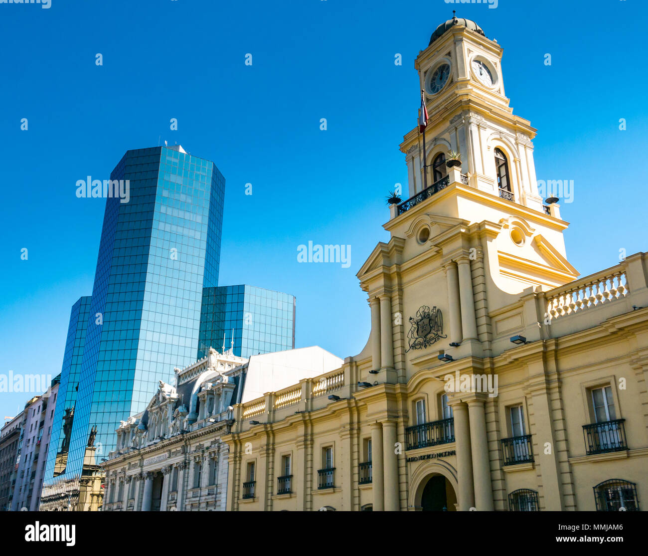 Historic National History Museum and Post Office buildings with modern glass skyscraper, Plaza de Armas, Santiago, Chile, South America Stock Photo
