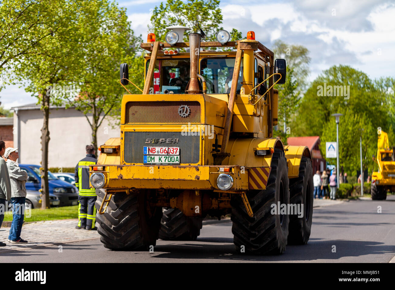 ALTENTREPTOW MECKLENBURG- WEST POMERANIA - MAY 1, 2018: Russian Kirowez K 700 tractor drives on street at an oldtimer show Stock Photo