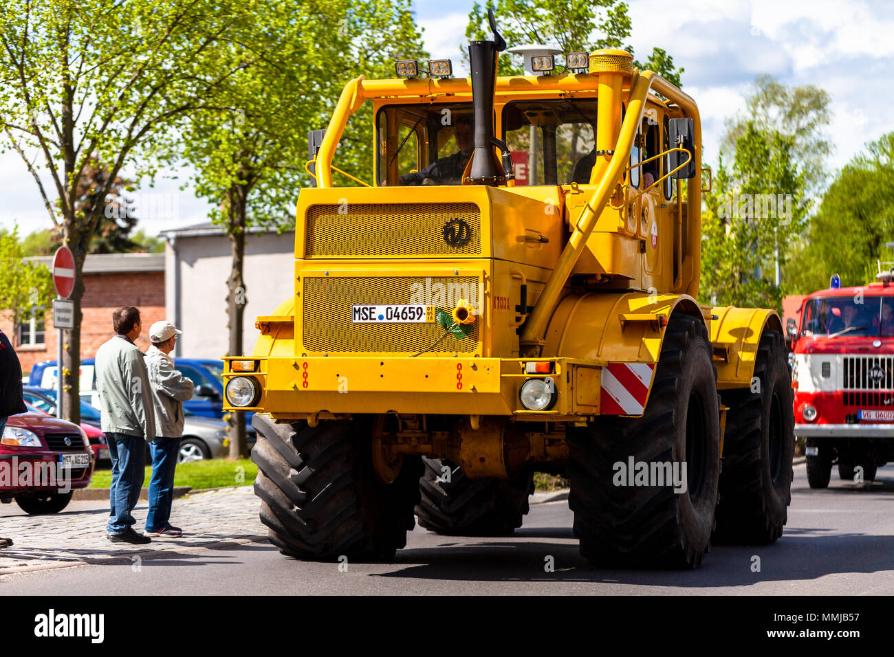 ALTENTREPTOW MECKLENBURG- WEST POMERANIA - MAY 1, 2018: Russian Kirowez K 700A tractor drives on street at an oldtimer show Stock Photo