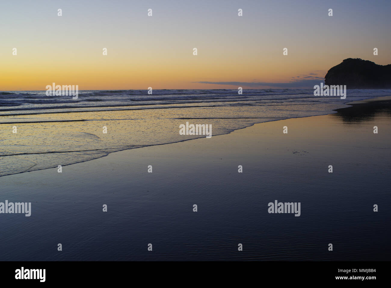 Sunset at Muriwai Beach, New Zealand Stock Photo