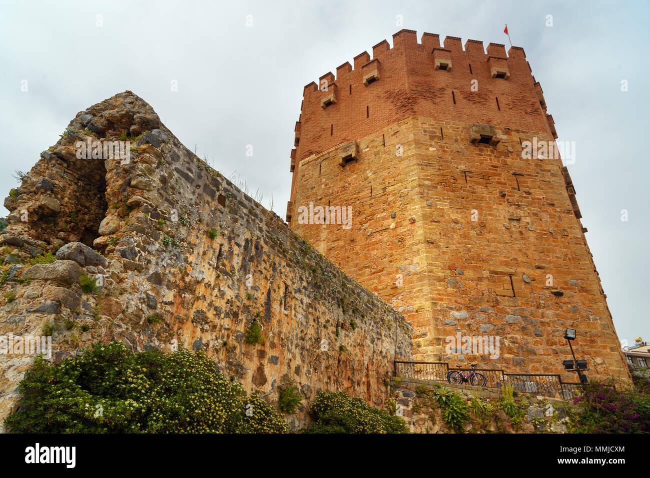 Red Tower, Kizil Kule made from red bricks in Alanya. Turkey Stock Photo