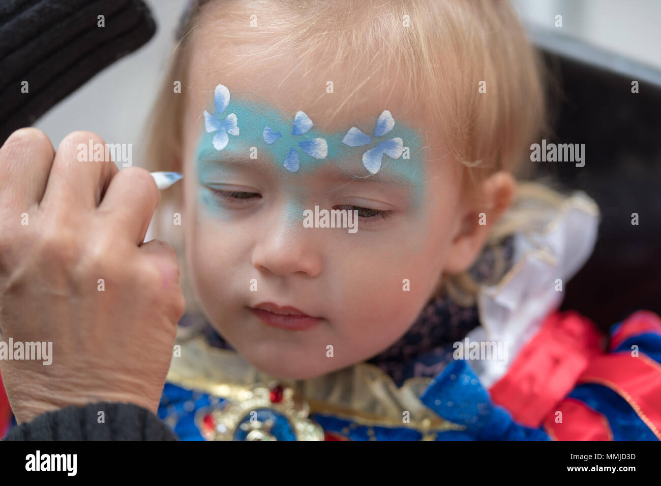 Face painting little girl Stock Photo Alamy