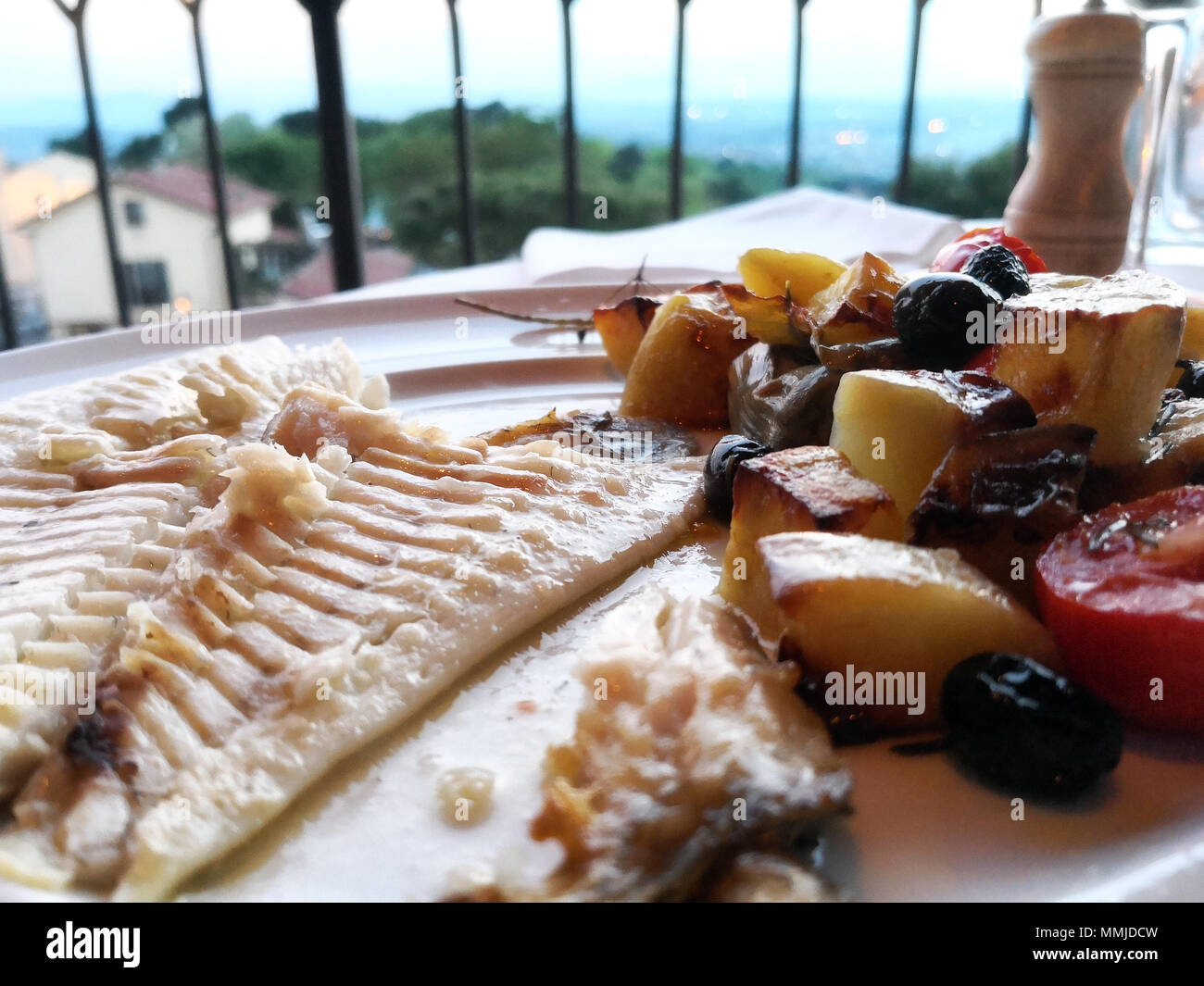 fish dish with vegetables Stock Photo Alamy
