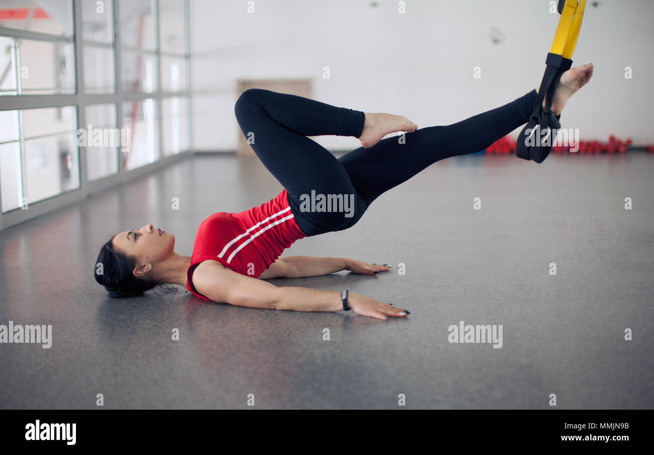 Fit Pretty Young Woman Doing Fly Yoga Stretching Exercises With Trx Fitness Straps In Fitness Training White Gym Loft Classroom Sport Healthy Lifesty Stock Photo Alamy