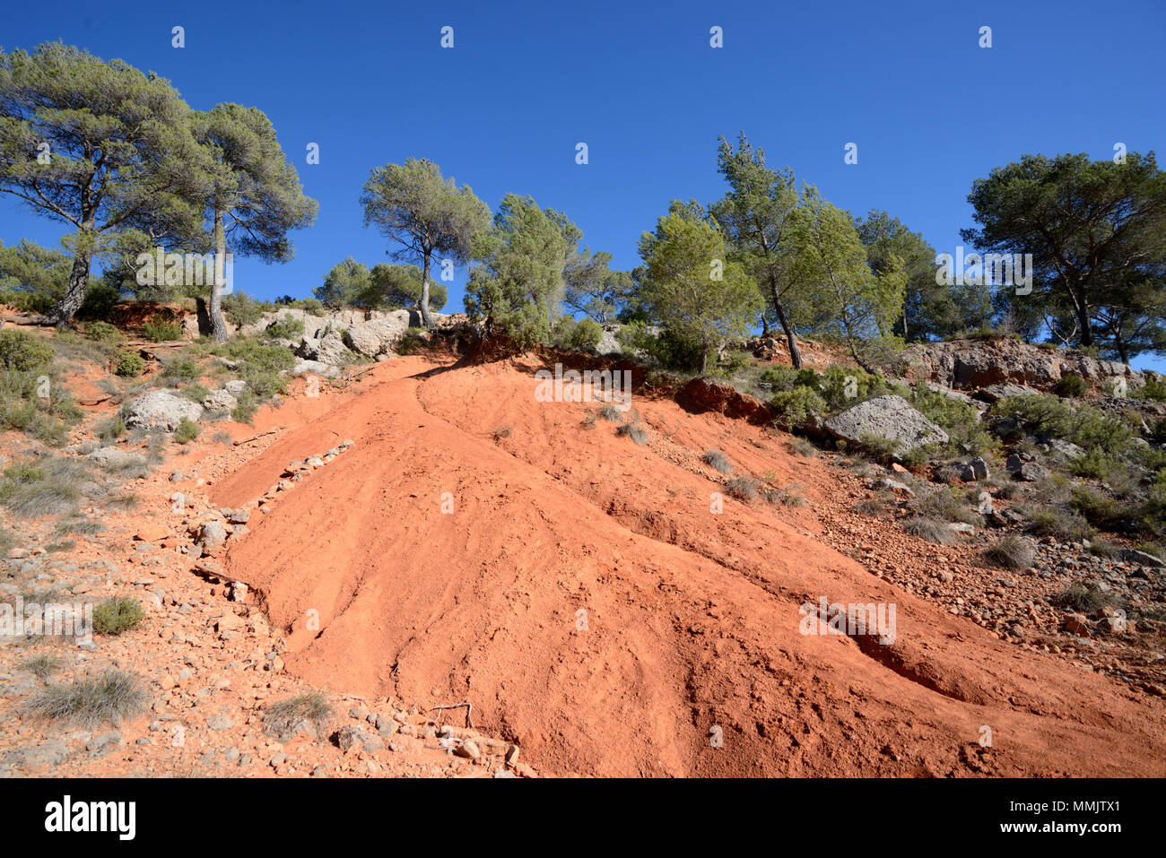 Ochre or Ocher Outcrops on the Lower Slopes of the Sainte-Victoire Mountain near Aix-en-Provence Provence France Stock Photo