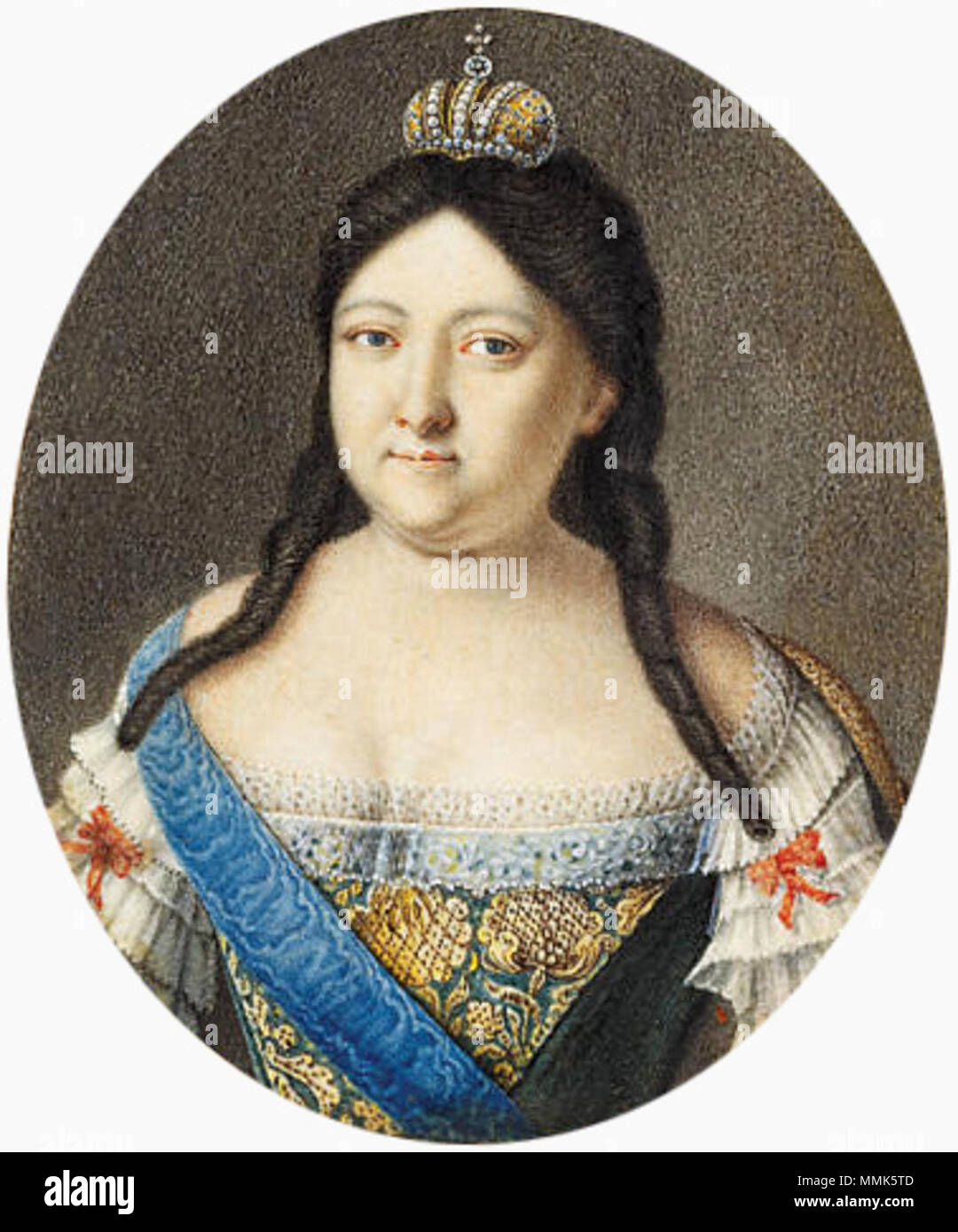 . English: RUSSIAN SCHOOL, CIRCA 1730 Empress Anna Ioannovna (1693-1740), in blue dress with yellow floral-embroidered bodice, red bows on her tiered lace sleeves, wearing the blue moiré sash of the Imperial Russian Order of St. Andrew, a miniature gold and pearl crown on her long dark hair.   . circa 1730.   Anonymous Russian painter (1670s-1917) Public domain image (according to PD-RusEmpire) Anna Ioannovna portrait miniature 2 Stock Photo