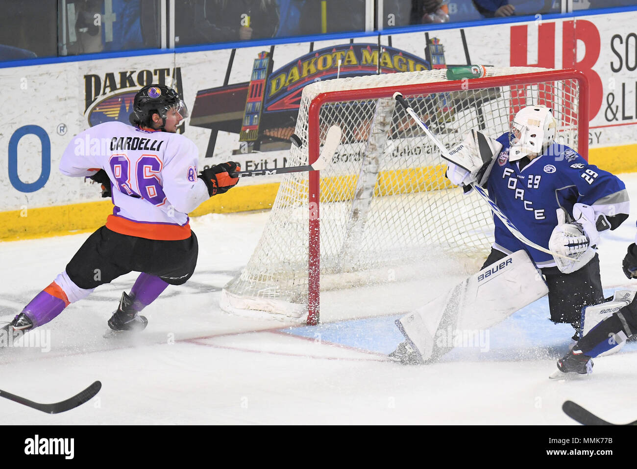 Fargo, North Dakota, USA. 11th May, 2018. Youngstown Phantoms forward Nicholas Cardelli (86) attempts to bat the puck out of the air in front of Fargo Force goaltender Strauss Mann (29) in game one of the finals for the United States Hockey League's Clark Cup held at Scheels Arena in Fargo, North Dakota.Russell Hons Credit: csm/Alamy Live News Stock Photo