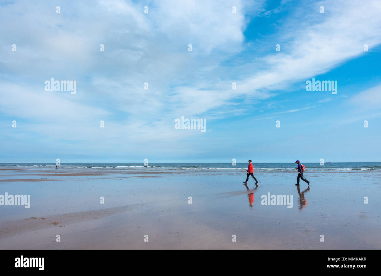 Nordic walking on beach at Saltburn by the sea, North Yorkshire ...