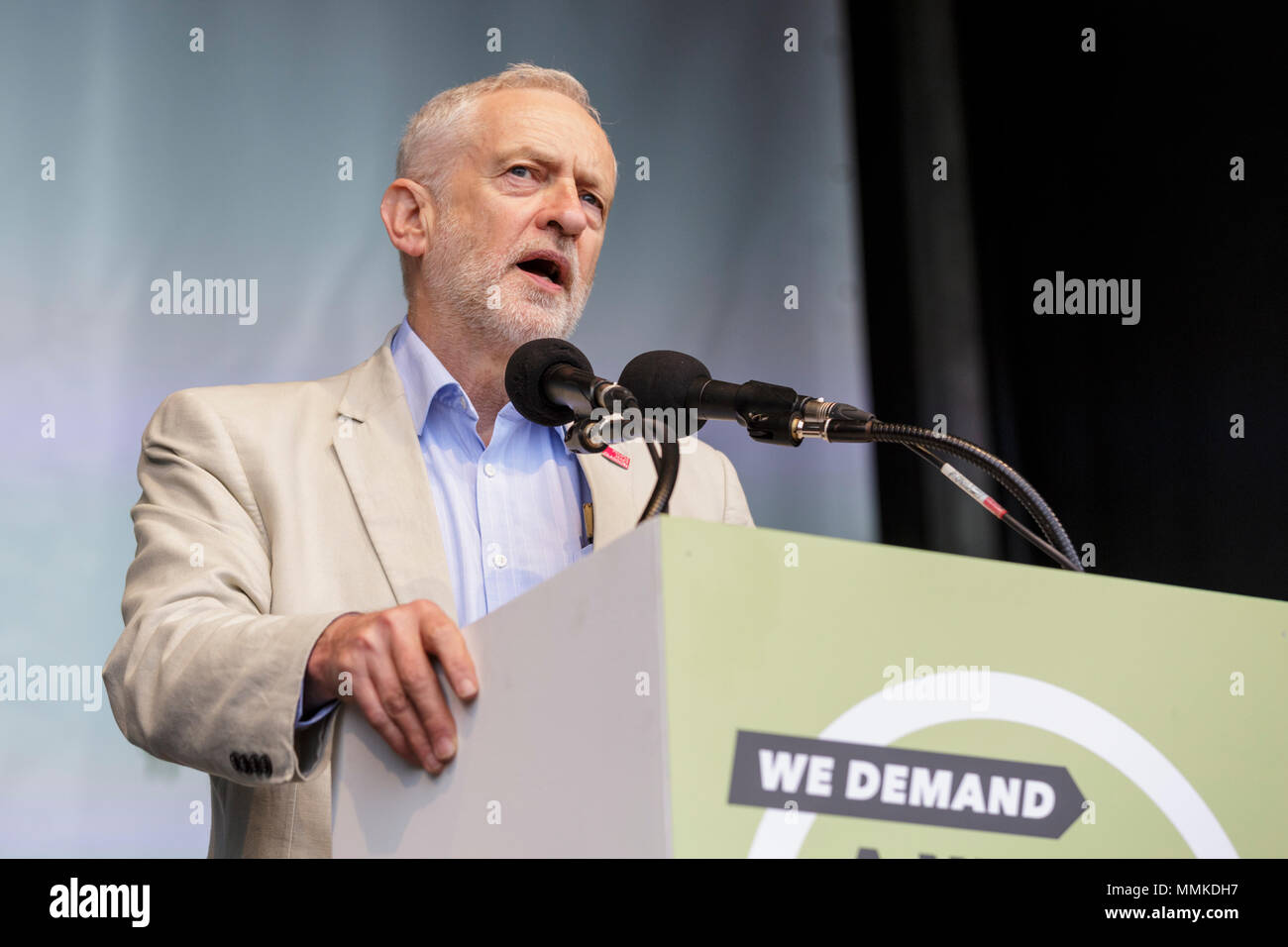 Westminster, London, 12th May 2018. Labour Party leader Jeremy Corbyn speaks at the rally in Hyde Park. The TUC march processes through central London from Victoria Embankment to Hyde Park for a rally. The march has the theme ' a new deal for working people', aimed against government austerity and injustice. Credit: Imageplotter News and Sports/Alamy Live News Stock Photo