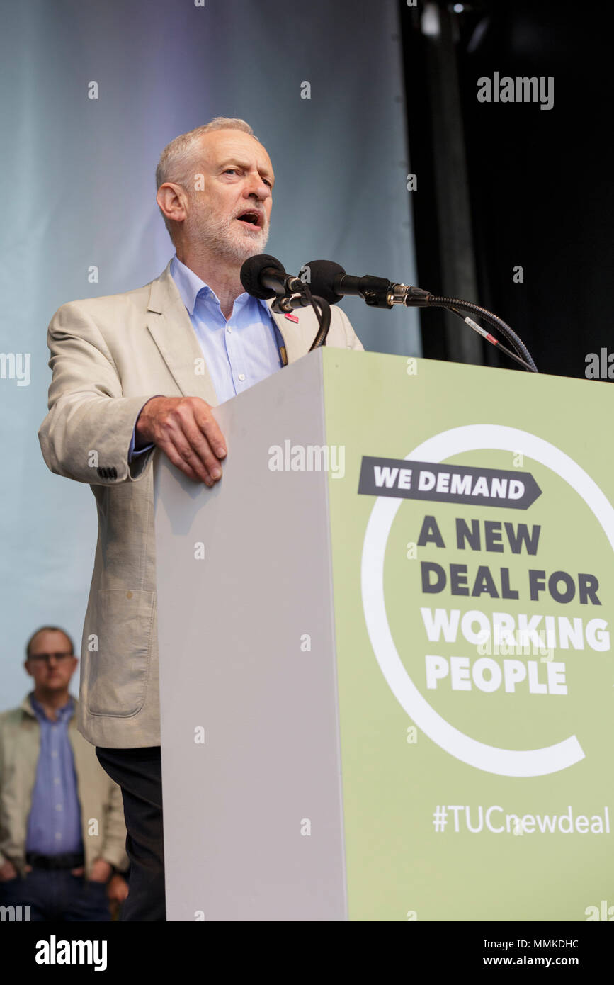 Westminster, London, 12th May 2018. Labour Party leader Jeremy Corbyn speaks at the rally in Hyde Park. The TUC march processes through central London from Victoria Embankment to Hyde Park for a rally. The march has the theme ' a new deal for working people', aimed against government austerity and injustice. Credit: Imageplotter News and Sports/Alamy Live News Stock Photo