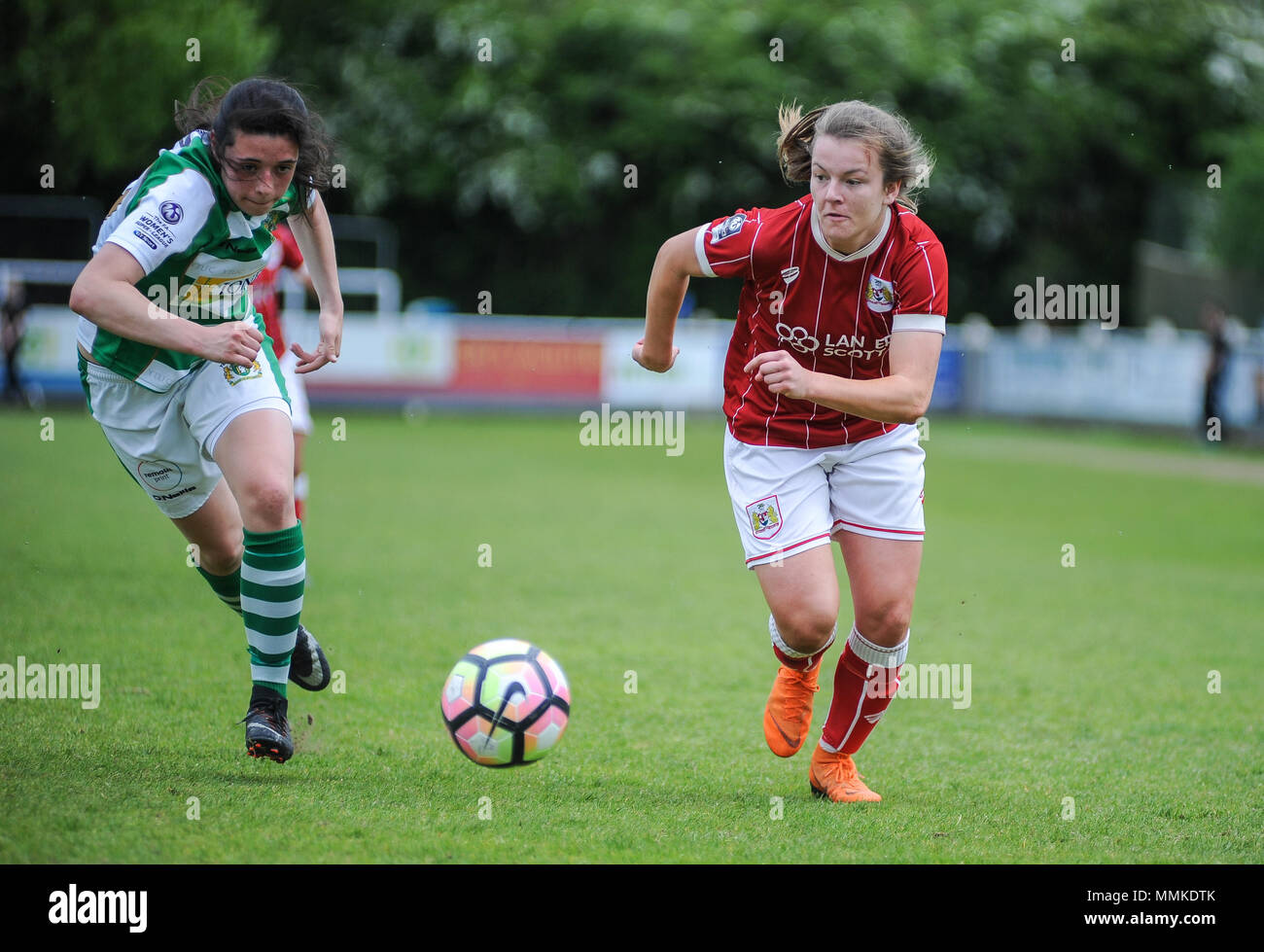 Taunton, England. 12th May 2018.  Lauren Hemp of Bristol goes past Thierry-Jo Gauvain of Yeovil during the WSL match between Yeovil Town Ladies FC and Bristol City Women FC at The Viridor Stadium. © David Partridge / Alamy Live News Stock Photo