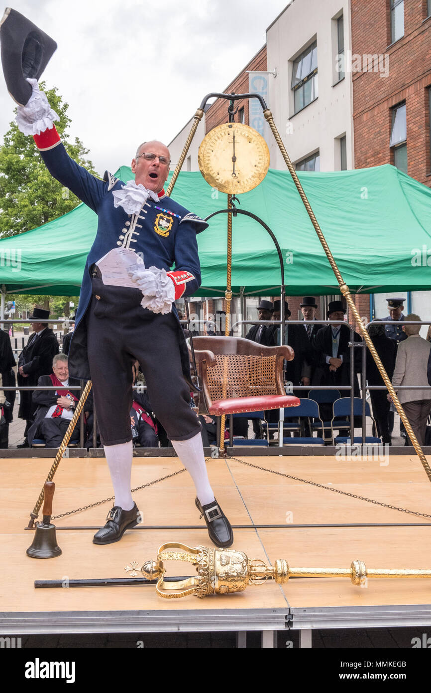 Saturday May 12th 2018. High Wycombe, Buckinghamshire, England, GB, UK. The quaint local tradition of 'Weighing in the Mayor' took place in the town centre today.  Traditionally, the outgoing and incoming mayor and civic officials are weighed at the beginning of the mayor's term of office each year to ascertain if they have gained weight at the expense of the taxpayer. Credit: D. Callcut/Alamy Live News Stock Photo
