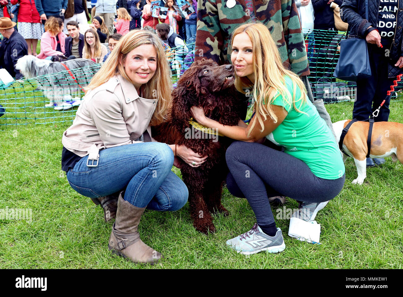 London, UK. 12th May 2018. Judges Anneka Svenska and Pip Tomson with Finn McCool the Irish Water Spaniel at the All Dogs Matter Great Hampstead Bark Off, Hampstead Heat, London. All Dogs Matter is a charity dedicated to helping and re-homing dogs see www.alldogsmatter.co.uk for more information. Credit: Paul Brown/Alamy Live News Stock Photo