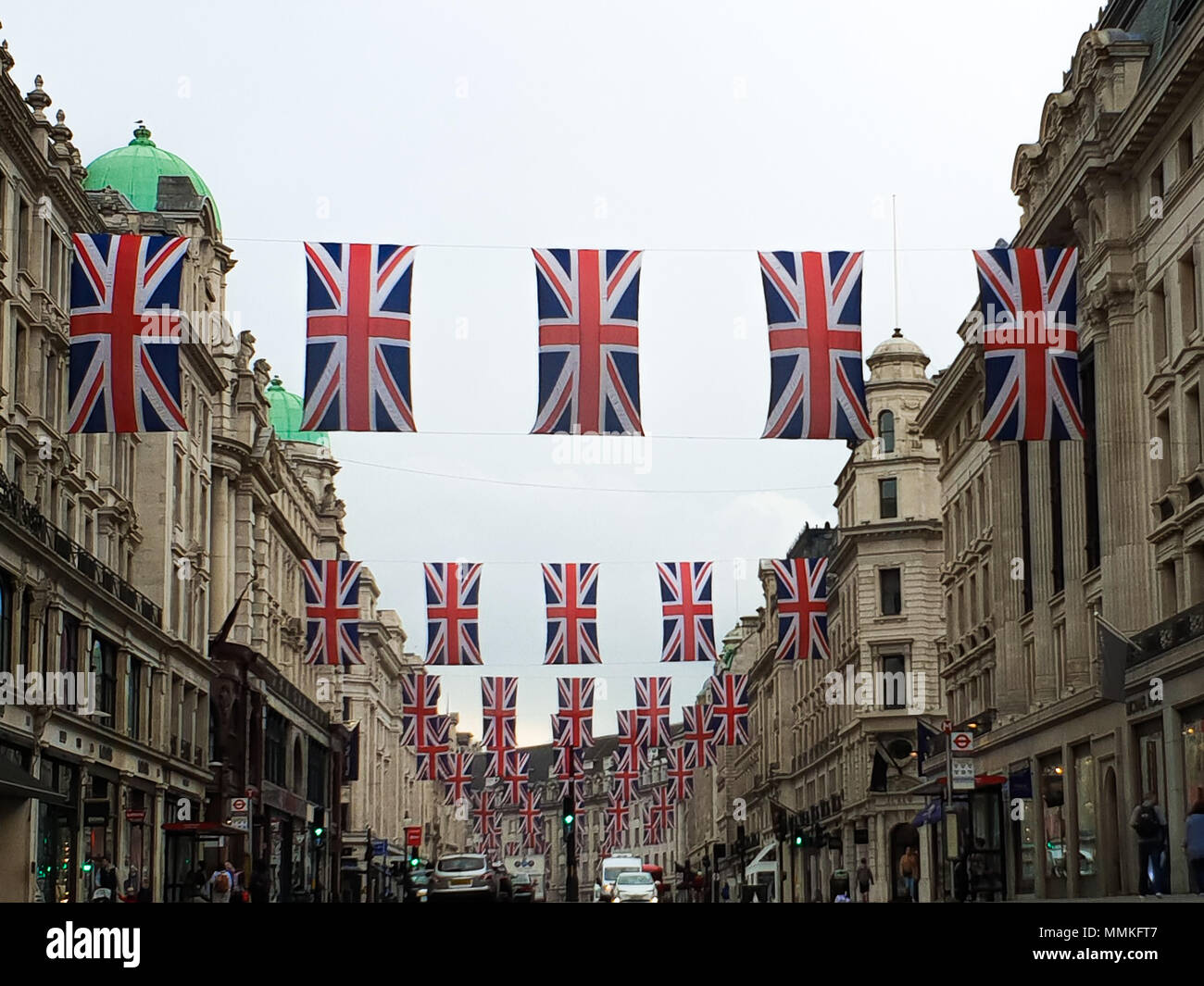 London, UK. 12th May 2018.  - Union flags hangs above LondonÕs Regent Street ahead of the Royal Wedding of Prince Harry and  Meghan Markle on 19 May 2018 at St George's Chapel in Windsor Castle. Credit Roamwithrakhee /Alamy Live News Stock Photo