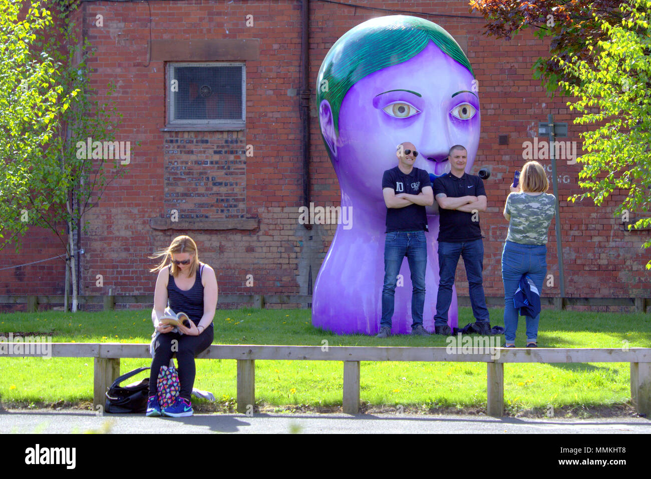 Glasgow, Scotland, UK 12th May.UK Weather::Taps Aff summer weather appears in the city as locals and tourists enjoy the hot day near .Nicolas Party The Modern Institute, Aird's Lane Green Space part of the Glasgow international 2018.  Gerard Ferry/Alamy news Credit: gerard ferry/Alamy Live News Stock Photo