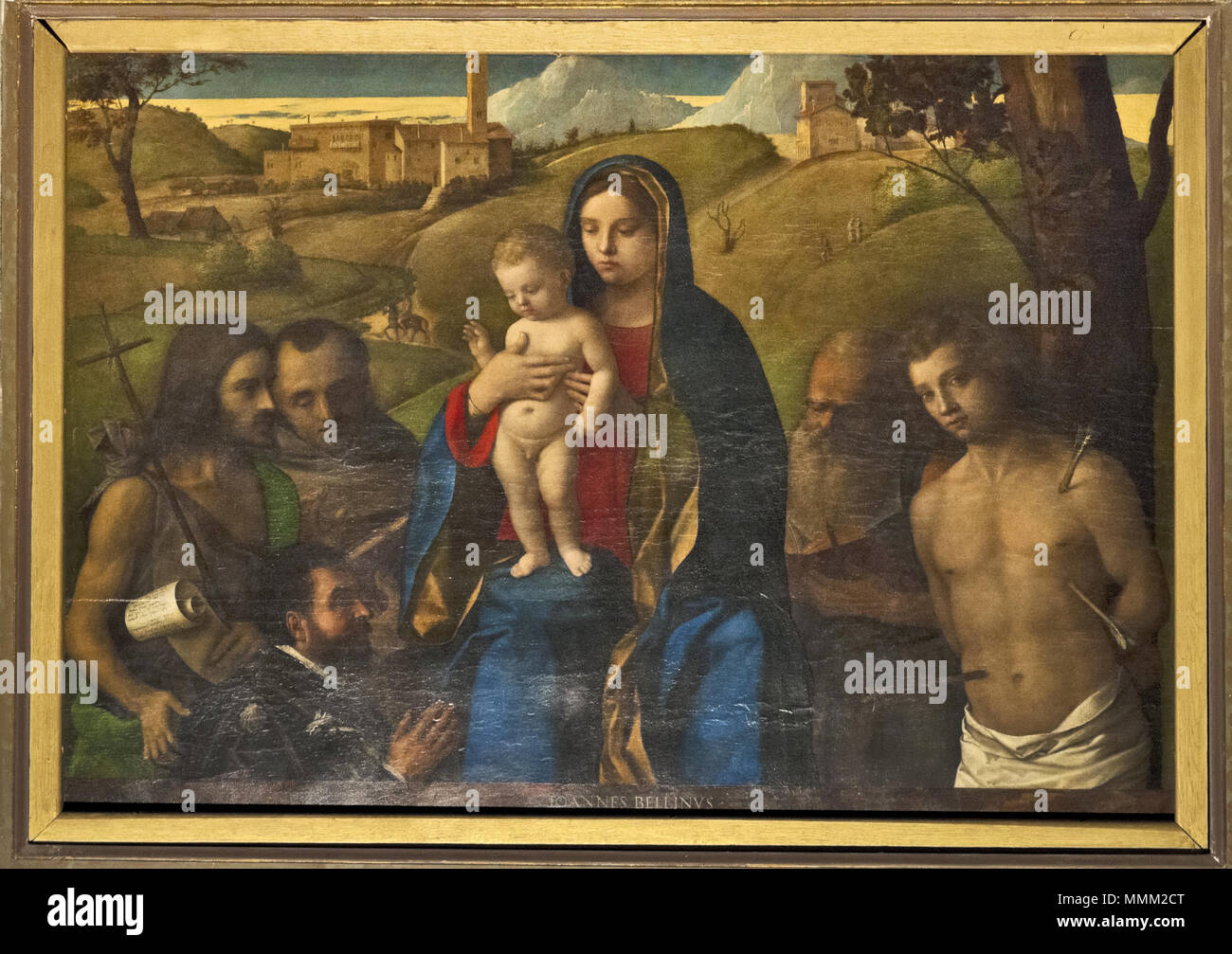 Bellini Giovanni, Madonna e santi (1507) Stock Photo