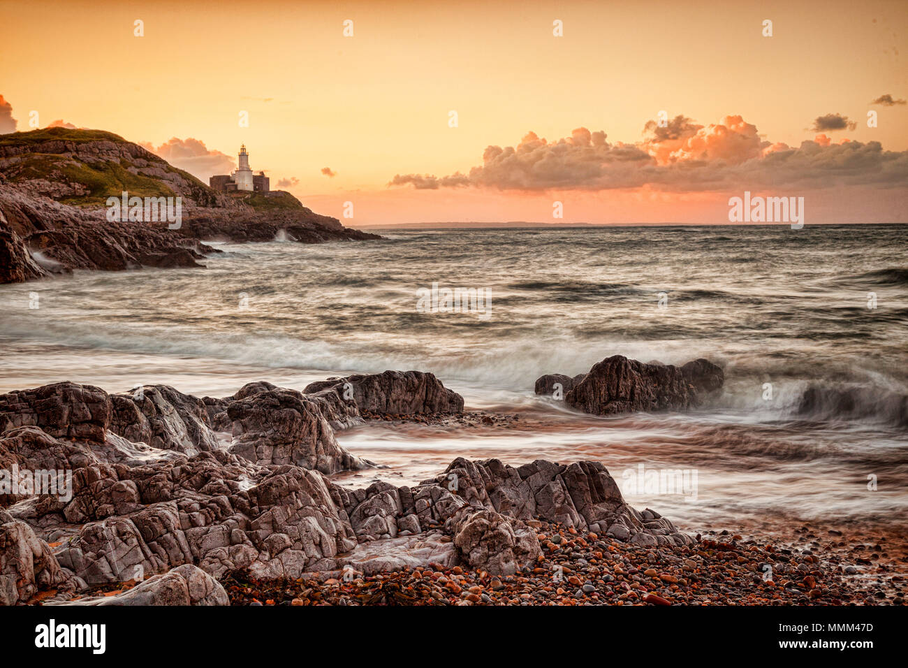 Dawn at Bracelet Bay on the Gower Peninsula, Soth Wales, UK. Stock Photo