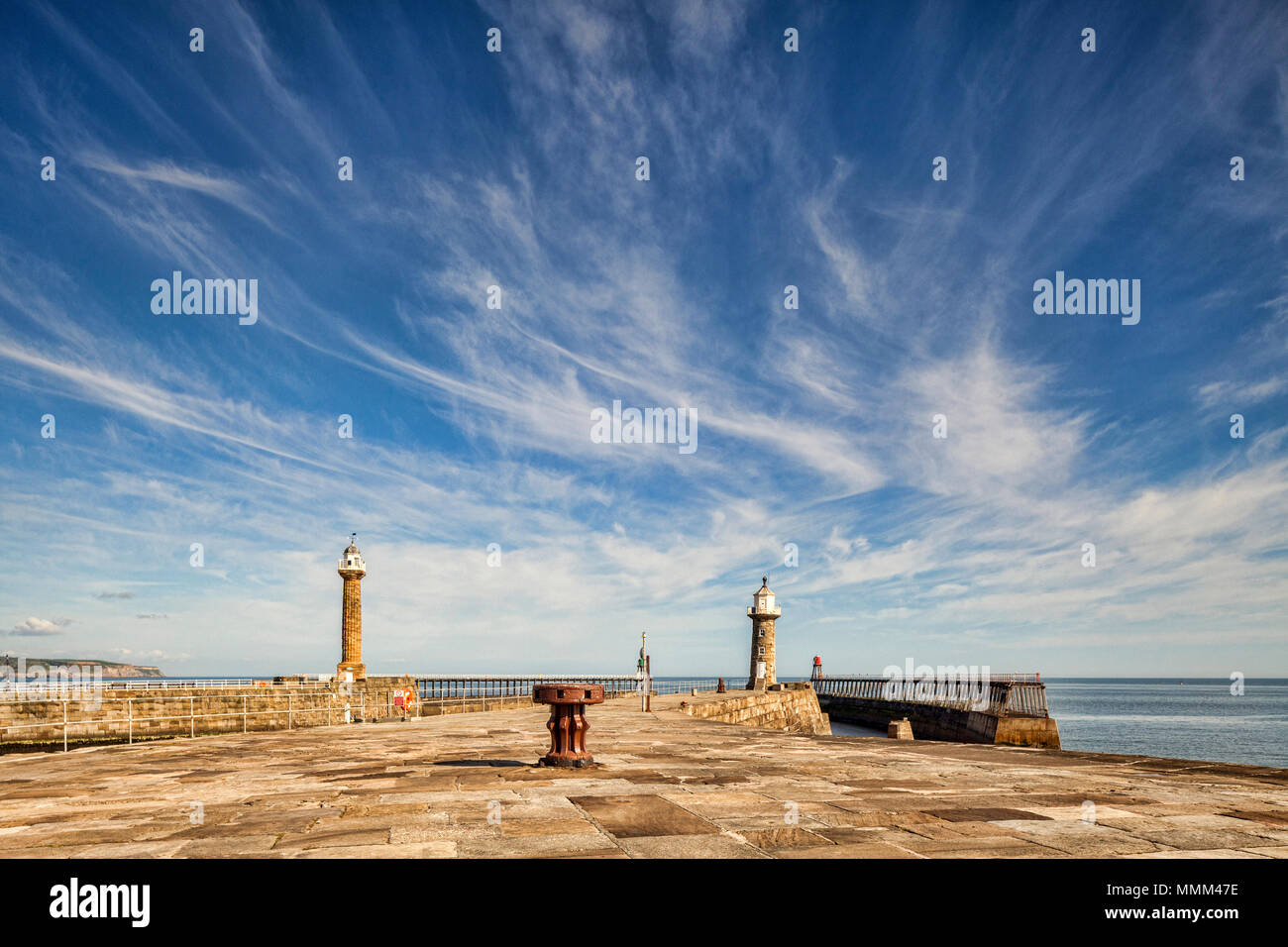 The East Pier and lighthouses at the entrance to Whitby Harbour, North Yorkshire. Stock Photo