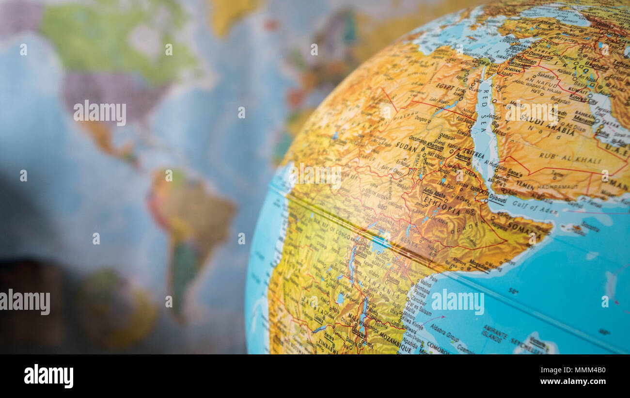 Africa and middle east map on a globe with earth map in the background Stock Photo - Alamy