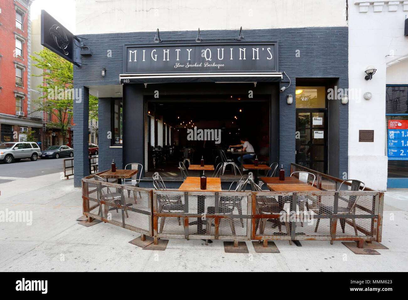 Mighty Quinn's Barbeque, 103 Second Ave, New York, NY. exterior storefront of a bbq eatery in the East Village neighborhood of Manhattan. Stock Photo