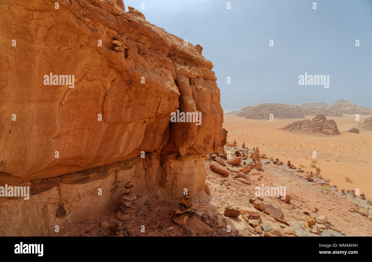 Composite panorama of high resolution aerial photos of a monolithic mountain in the central area of the desert reserve of Wadi Rum, Jordan, middle eas Stock Photo