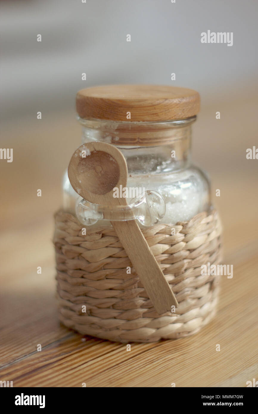 Sugar bowl - pot with the sugar and a little wooden spoon Stock Photo