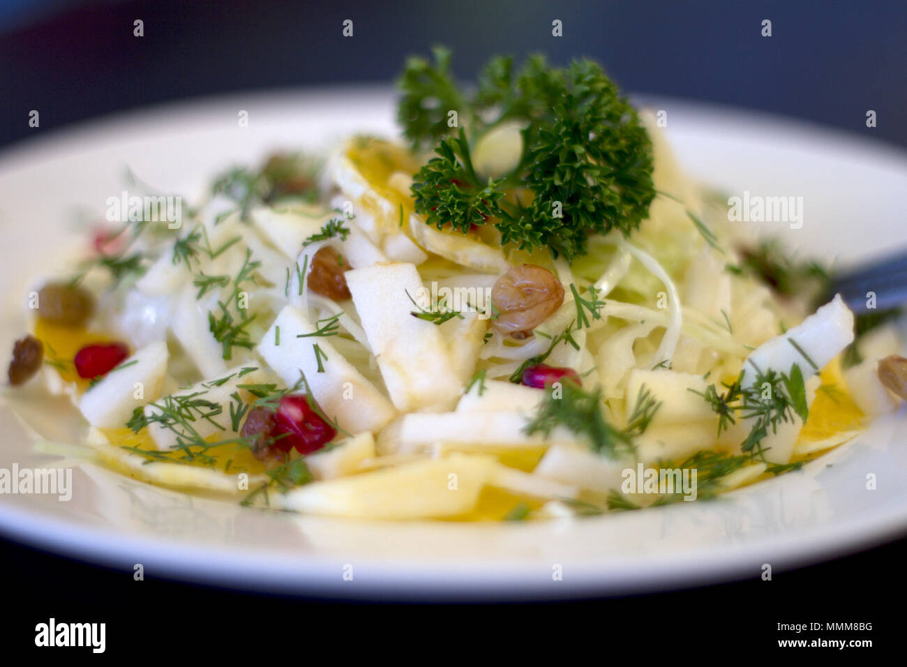 Mixed vegetables on  a plate against dark background Stock Photo