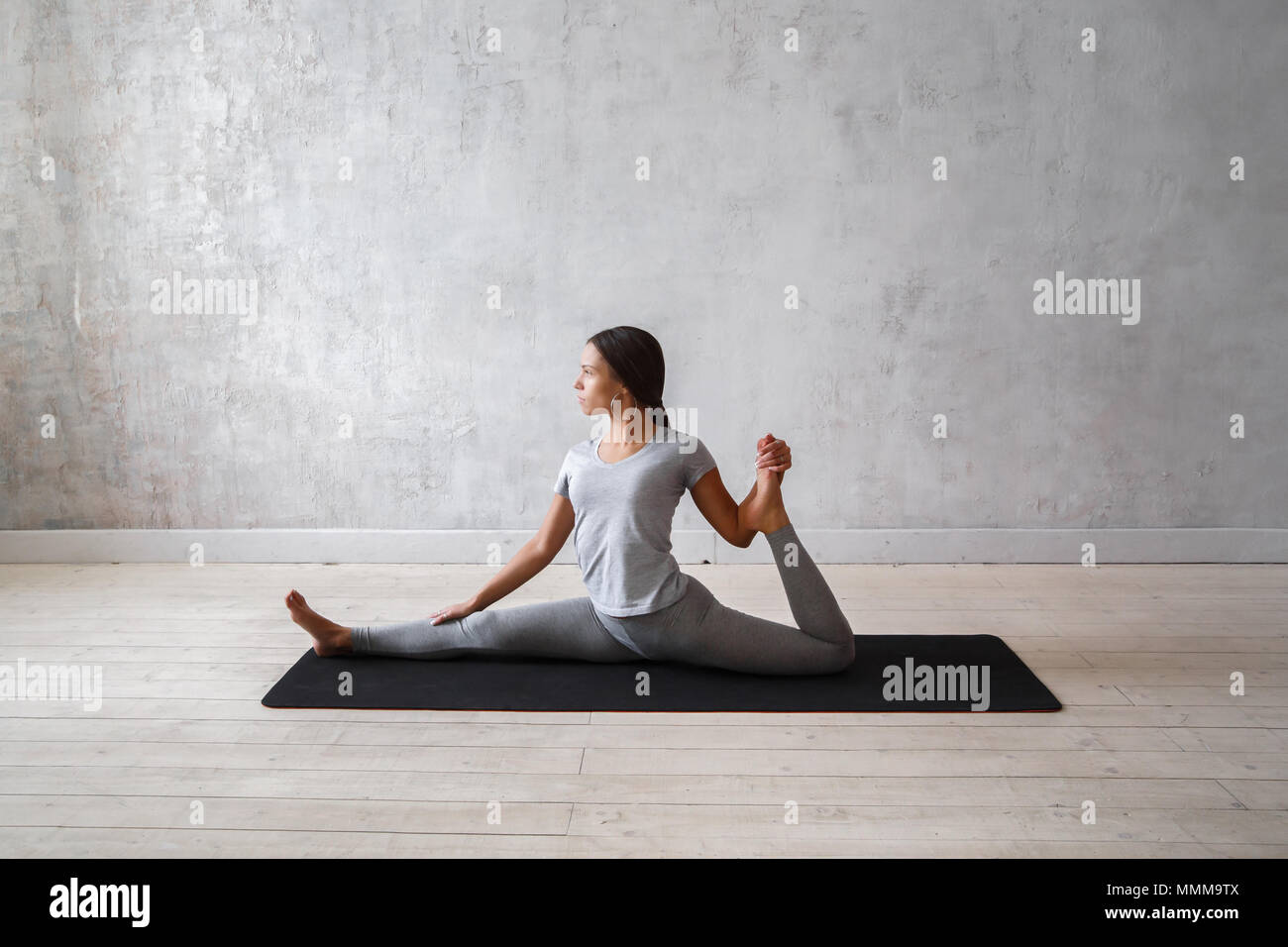 Woman practicing advanced yoga. A series of yoga poses Stock Photo Woman practicing advanced yoga. A series of yoga poses Stock Photo