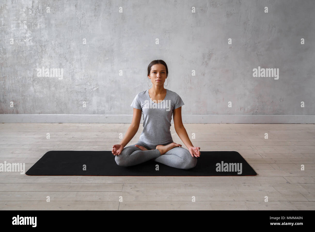 Woman practicing advanced yoga. A series of yoga poses. Stock Photo