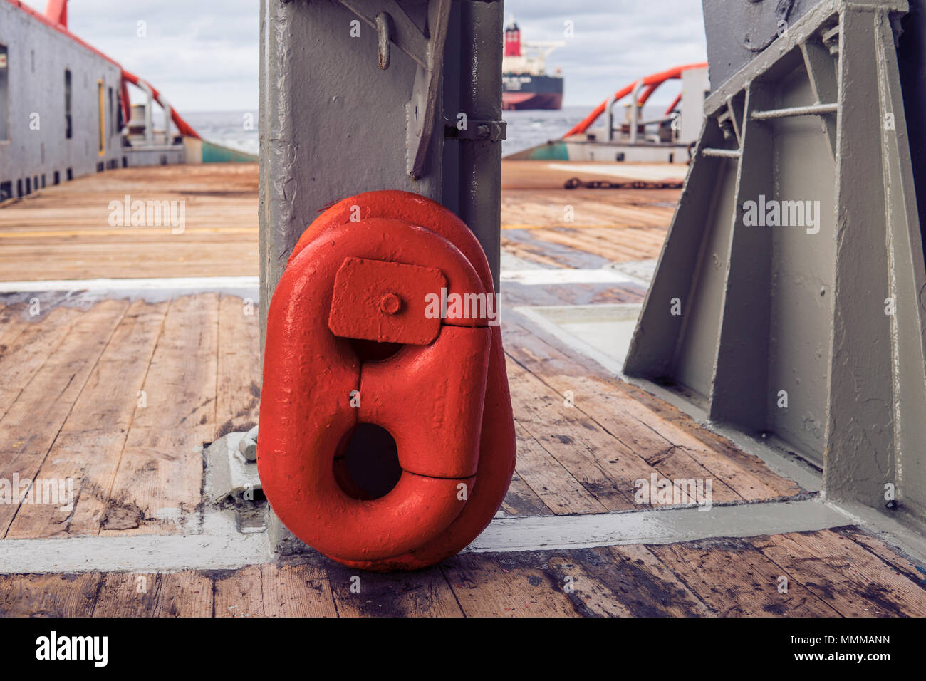 Closeup of pear shape quick link. Equipment of AHTS anchor handling towing supply tug vessel. Stock Photo