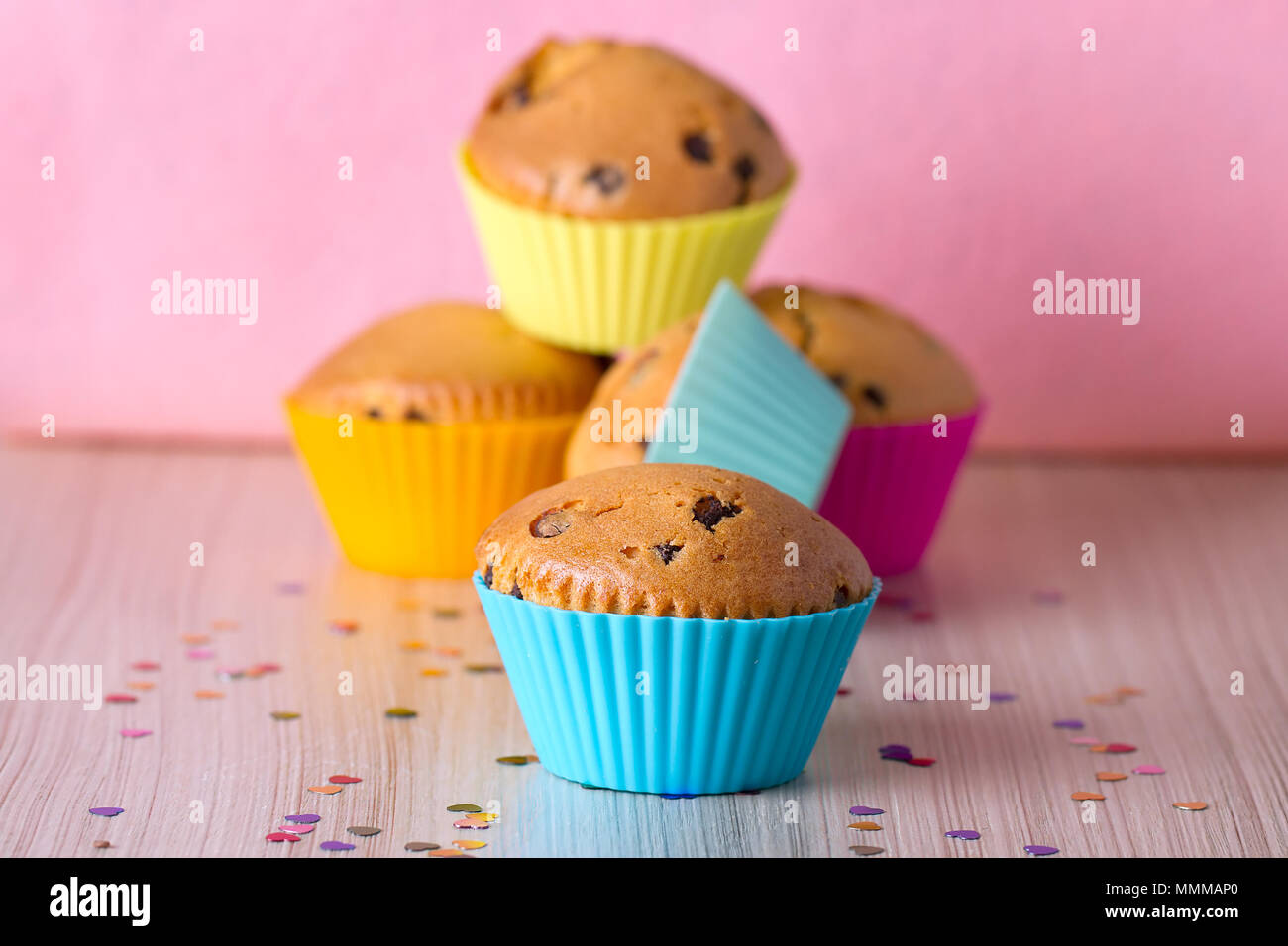 Homemade cupcakes with bright colored silicone molds Stock Photo Alamy