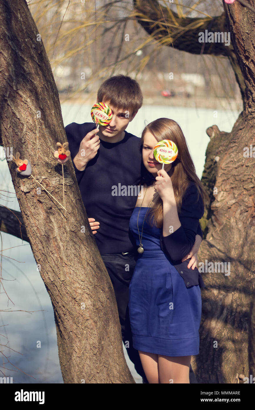 Romantic teenage couple tree in hi-res stock photography and images - Alamy