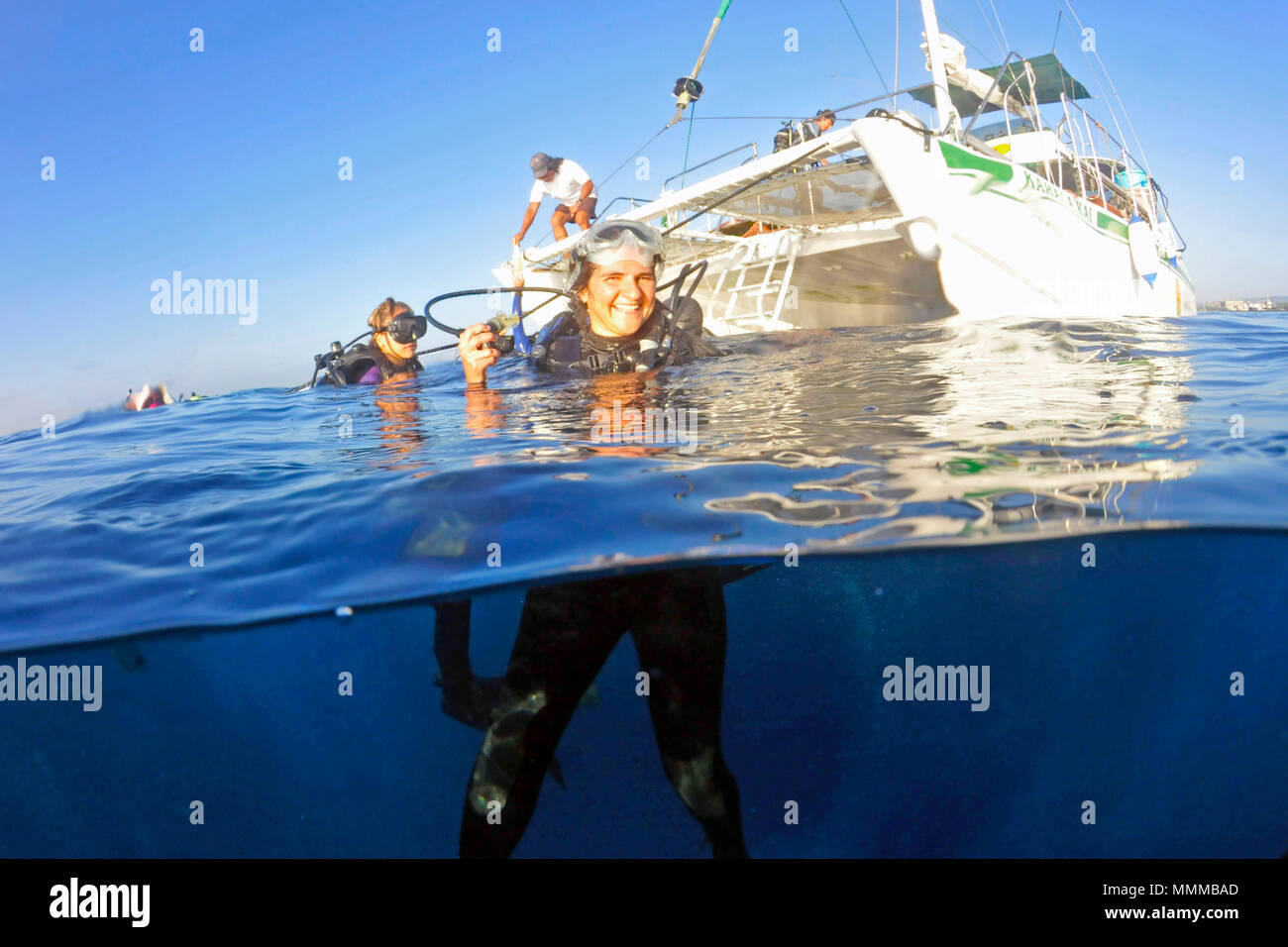 Woman diving in neoprene suit hires stock photography and images Alamy