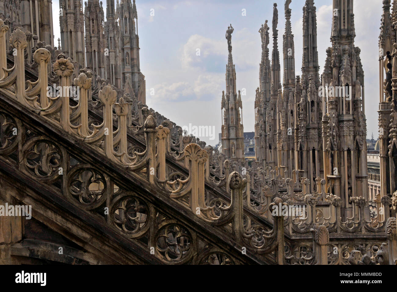 View of several gothic towers at the rooftop of the Duomo Cathedral, Milan, Italy Stock Photo