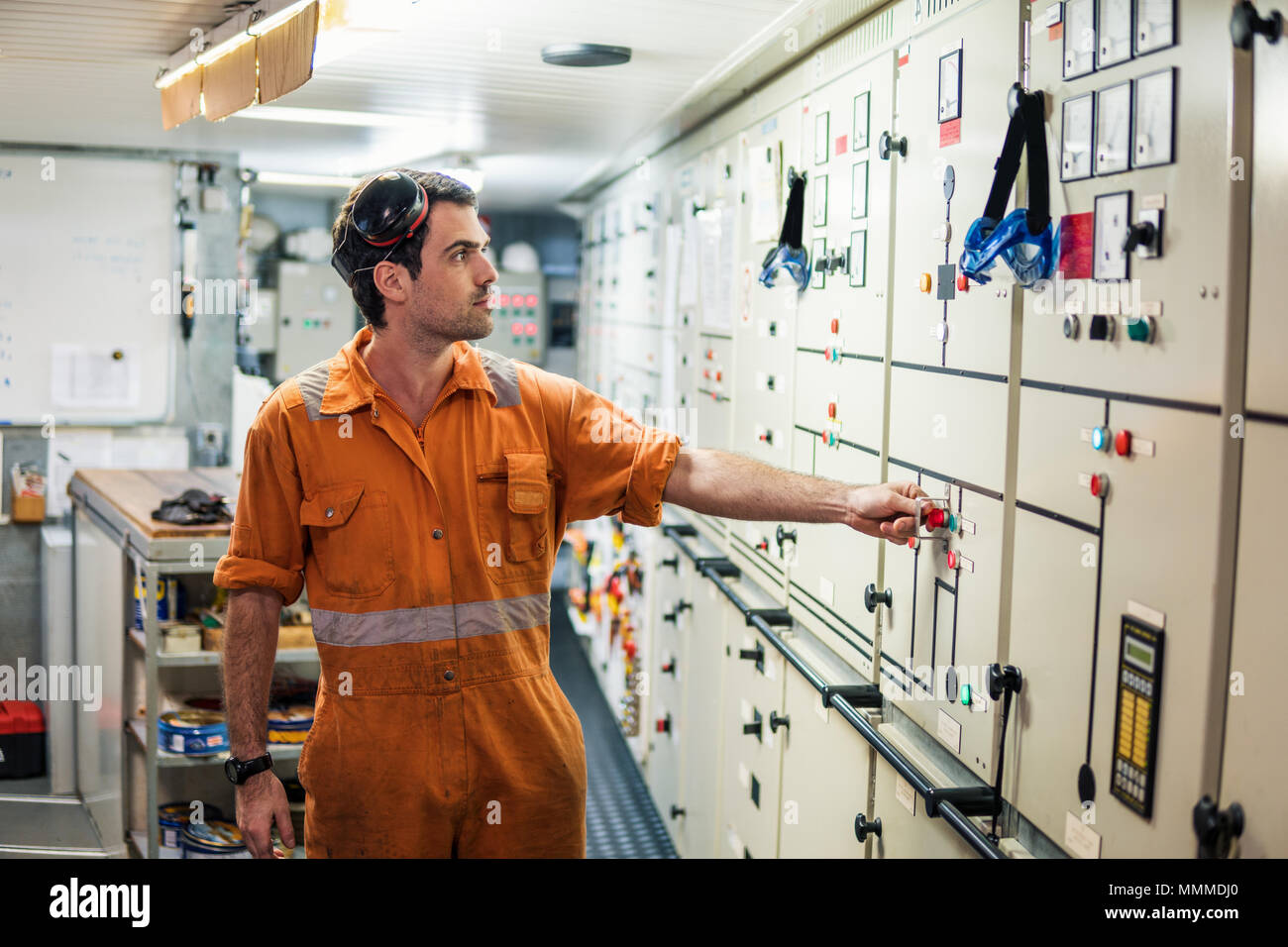 Marine engineer officer controlling vessel engines and propulsion in