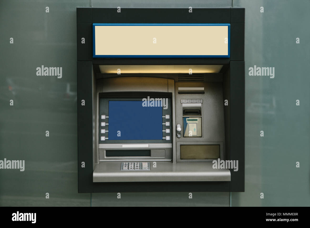 Modern street ATM machine for withdrawal of money and other financial transactions Stock Photo